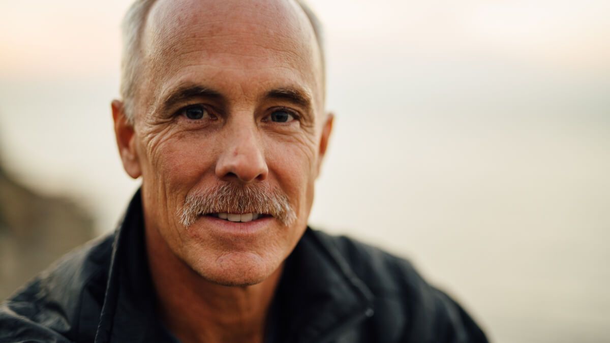 Close up of older white man with a moustache