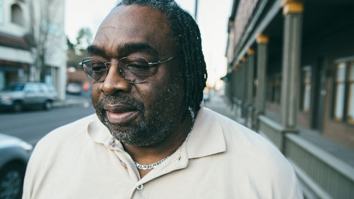 Close up of Black man wearing glasses